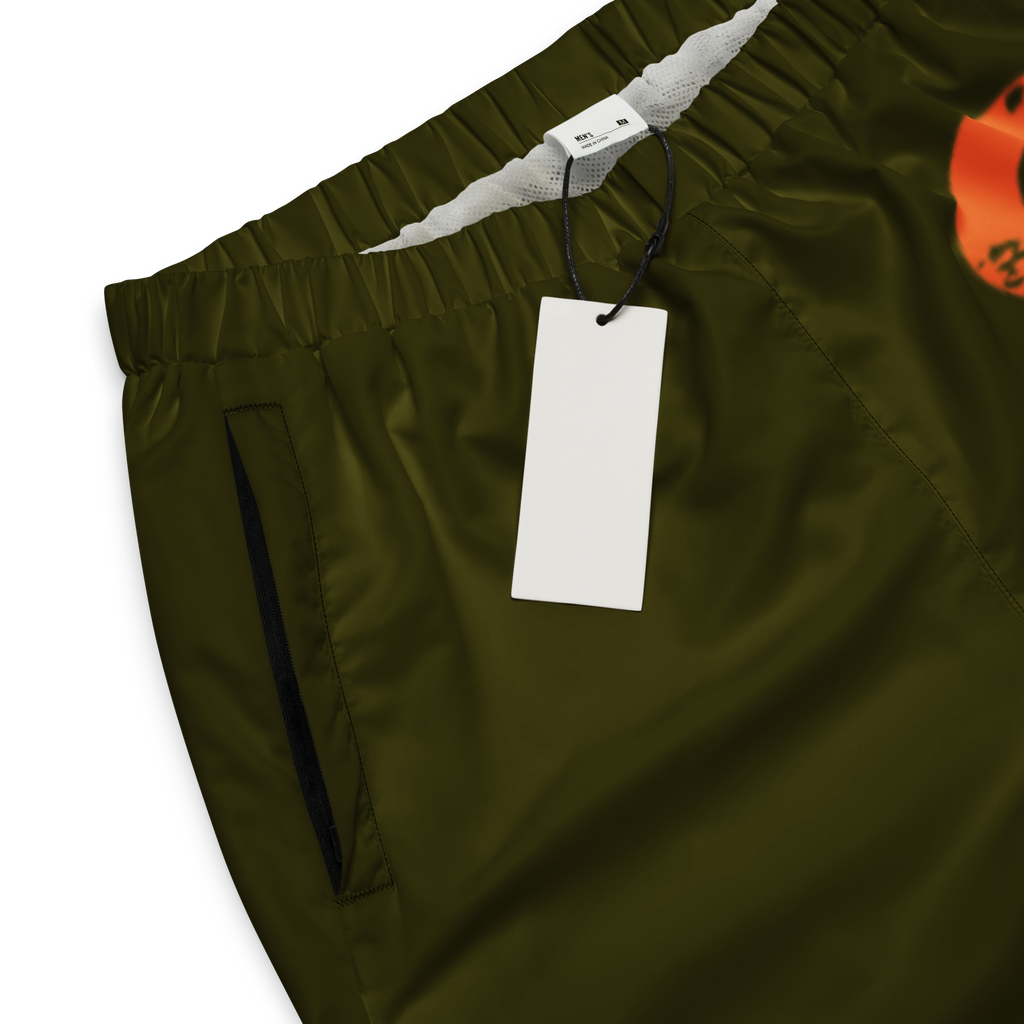 Clockwork Green and Orange Unisex track pants