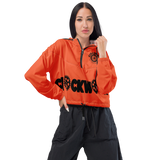 orange and black Clockwork Women’s cropped windbreaker