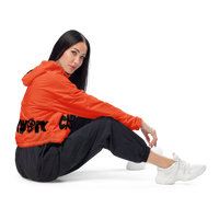 orange and black Clockwork Women’s cropped windbreaker