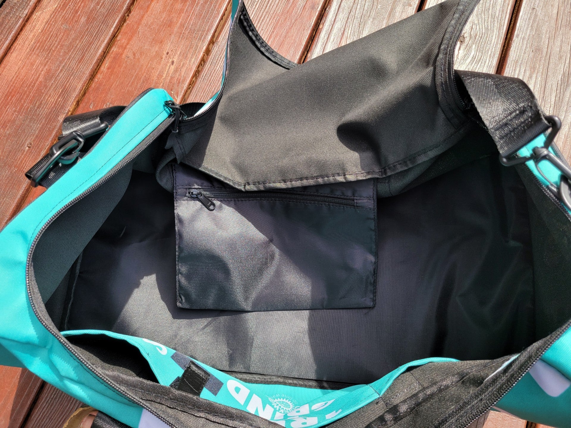 Clockwork Teal Duffle bag